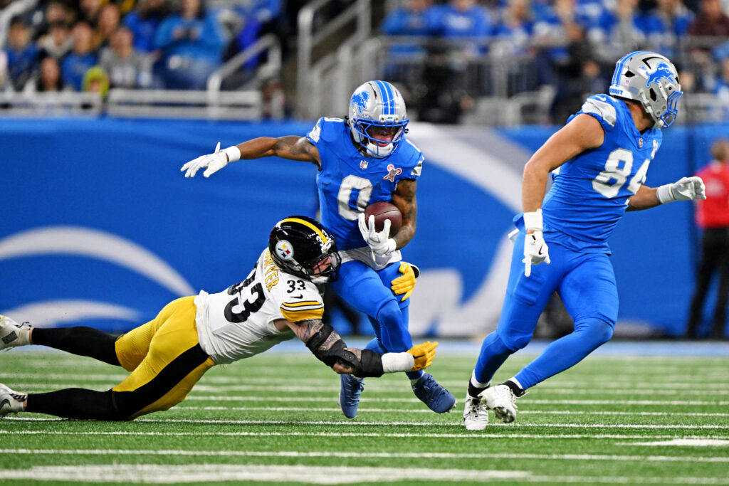 Detroit Lions running back Jahmyr Gibbs (0) runs the ball during the first quarter against the Pittsburgh Steelers at Ford Field.