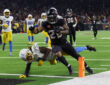 Houston Texans running back Joe Mixon (28) scores a touchdown against the Los Angeles Chargers in the fourth quarter in an AFC wild card game at NRG Stadium