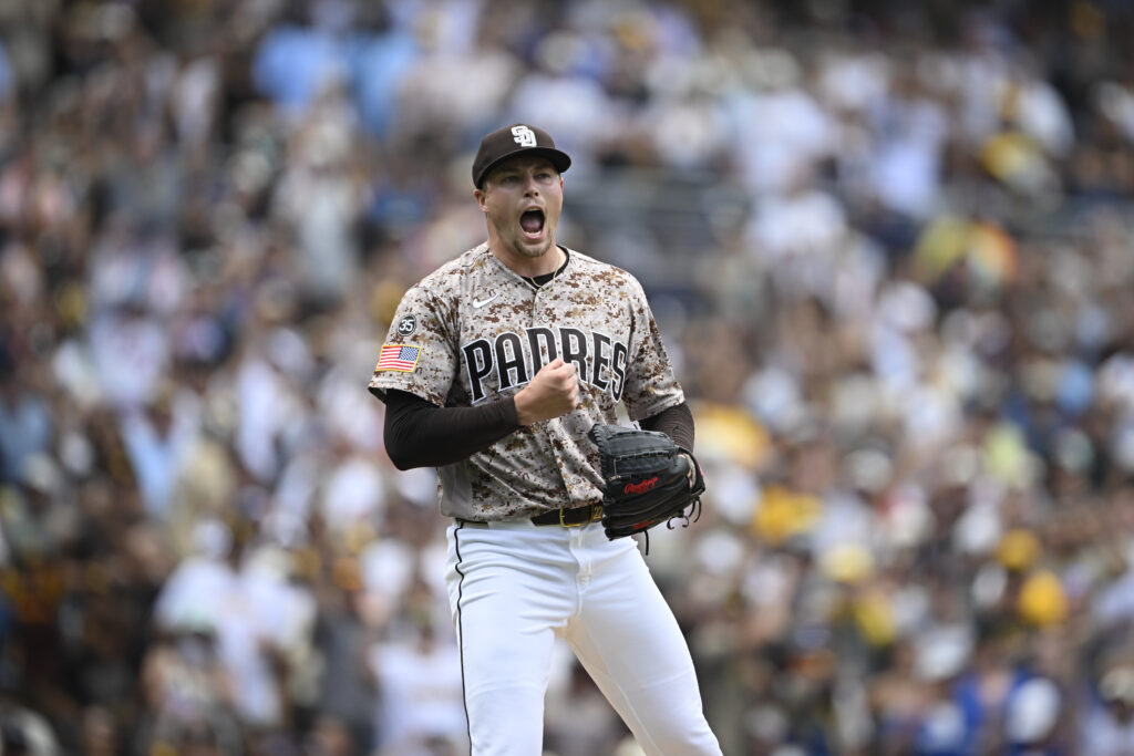 Jul 12, 2026; San Diego, California, USA; San Diego Padres pitcher Mason Miller (22) celebrates after the Padres beat the Toronto Blue Jays at Petco Park. Mandatory Credit: Denis Poroy-Imagn Images