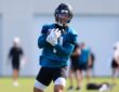 Jacksonville Jaguars wide receiver Parker Washington (11) runs the ball during the third day of minicamp at the Miller Electric Center