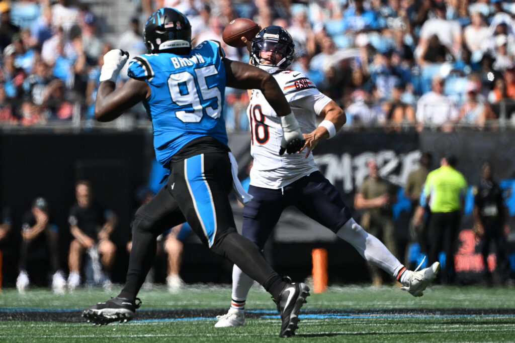 Carolina Panthers DE Derrick Brown and Chicago Bears QB Caleb Williams