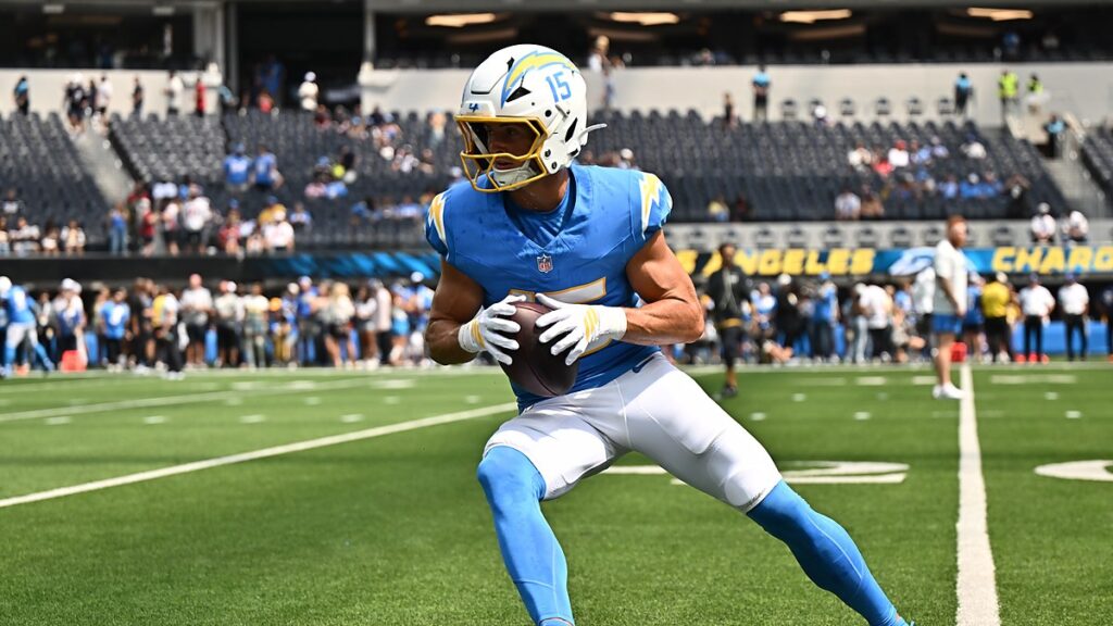 Los Angeles Chargers wide receiver Ladd McConkey tucks the ball after a catch during pregame warmups.